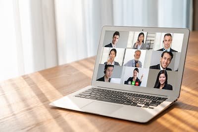 Laptop set up for a confidential telehealth therapy session